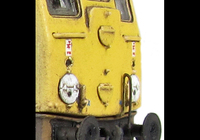 A picture of 24107 conversion to a plated over end door version with centre disc arrangement, etched work plates, extra pipe on nose as per prototype, battery box modification, body side steps plated over, detailed buffer beam at one end and semi detailed at coupling end, driver fitted, renumbered, moulded roof grill replaced with etched version including fan and slimmed down headcode discs with added catches.