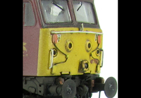 A picture of 47787 showing a full respray into EWS livery. Base model has been converted to a cutaway buffer beam example with etched kick plates and modified battery box. Other details include: detailed buffer beam at one end and semi detailed at coupling end, driver fitted, moulded nose handrails replaced with wire, renumbered, moulded roof grills replaced with etched fan and grill, mu cables added, etched nameplates/plaques, body lowered, finer ariels, and nose catch added