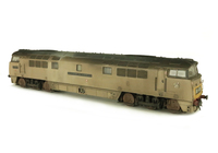 A picture of D1000 weathering based on prototype photos of the loco in a very faded dilapidated condition. Details include: etched nameplates, work plates and running numbers, detailed buffer beam at one end, semi detailed buffer beam at coupling end, driver added, brake rigging added, plastic panels added to headcodes, smaller holes on wheels, nose end moulded handrails and catch replaced with wire and brass versions. 