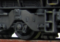 A picture of Close up of class 66 bogies.