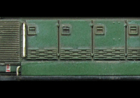 A picture of D9555 with detailed buffer beam at one end, etched Swindon workplate and cab colour lightened to match prototype.