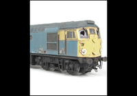A picture of 26018 Conversion to disc headcode version representing a loco in it's last days on the scrapline. Full respray into correct faded shades, renumbered, disc catches, special effect of paint peeling and rust patches, broken and boarded over windows, tapered steps with leaf spring bogies, brass oval buffers, straight framed side windows, speedo cable, removed boiler control access hatch, wire nose handrails, no rubber window surrounds, side body windows made flush and detailed buffer beam at both ends.