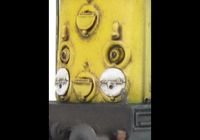 A picture of Close up of added fine discs and holes filled with respray of yellow.