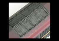 A picture of Close up of moulded roof grill replaced with etched version including pipes under the mesh.