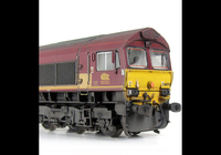 A picture of 66075 with faded paintwork. Moulded front handrails replaced with wire versions including pommels, springs added to bogie frames, front lashing eyes removed and moved, moulded steps below doors replaced with wire versions, moulded roof grill replaced with etched version including pipes under the mesh, renumbered, detailed buffer beam at one end and semi detailed at coupling end, coupling converted to NEM version, driver fitted and wing mirrors added